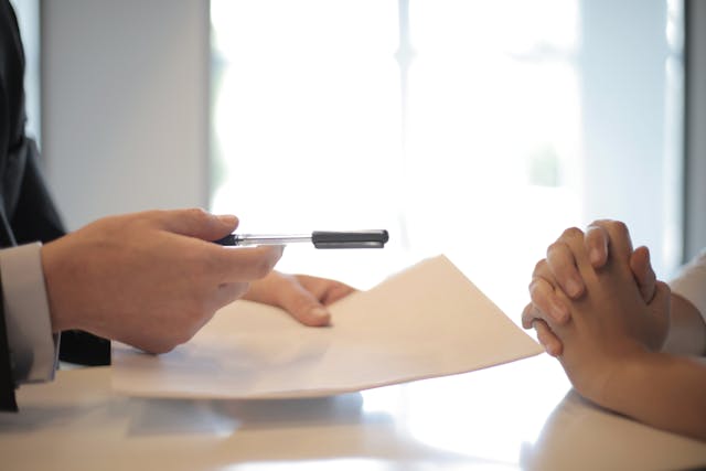 person%20passing%20over%20a%20document